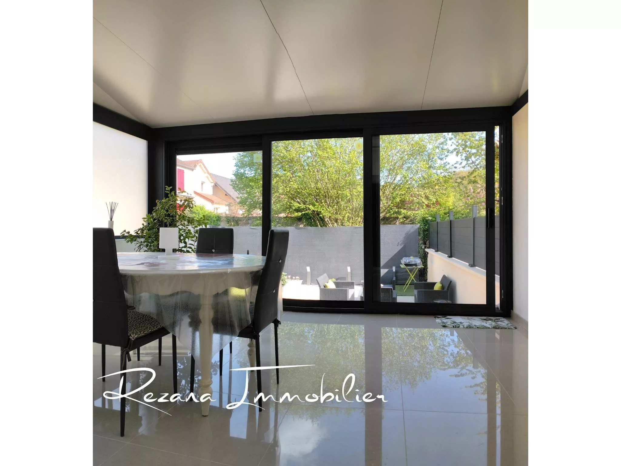 véranda avec vue sur terrasse maison Héricy