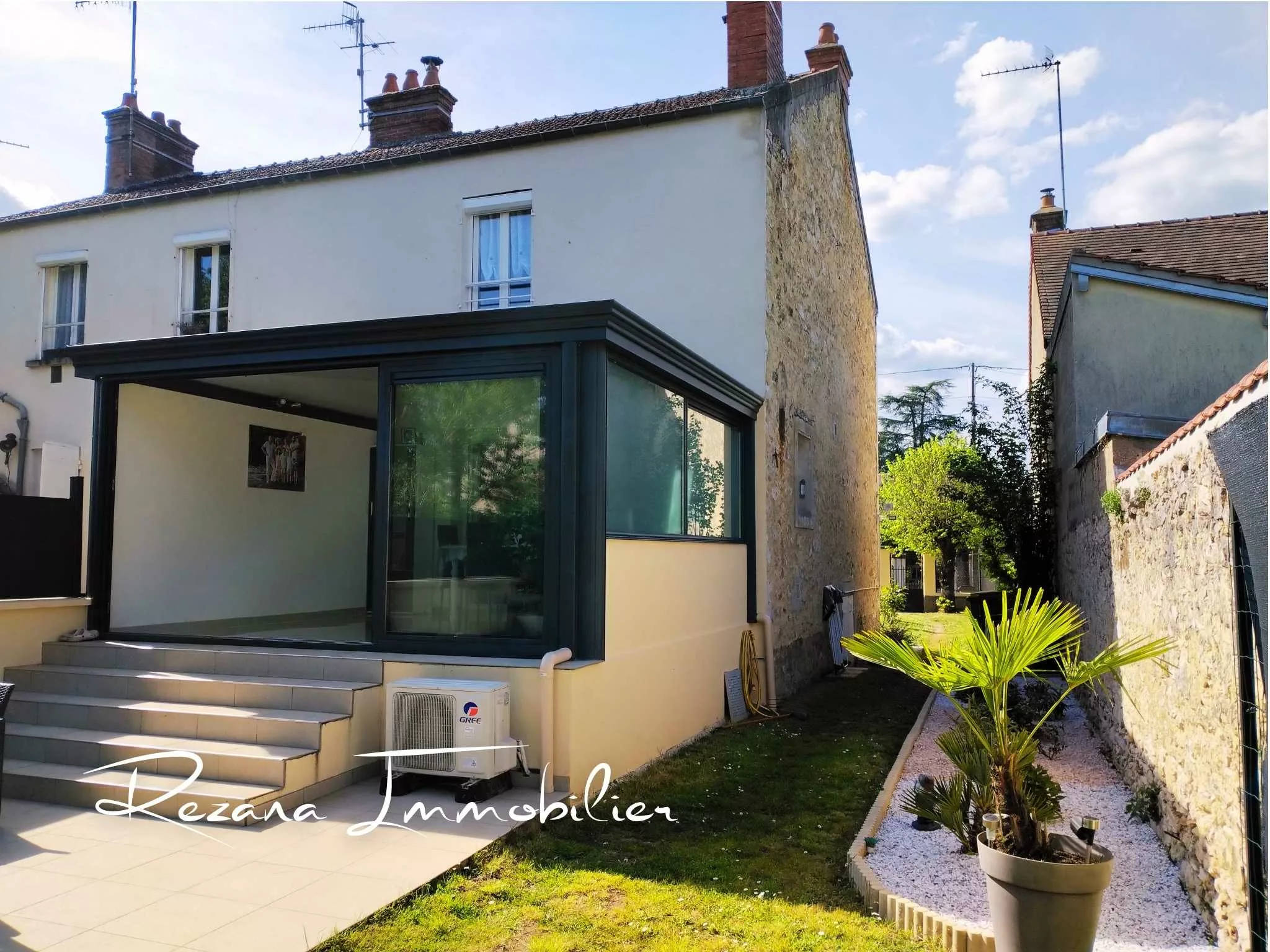 vue arrière maison avec véranda Héricy centre